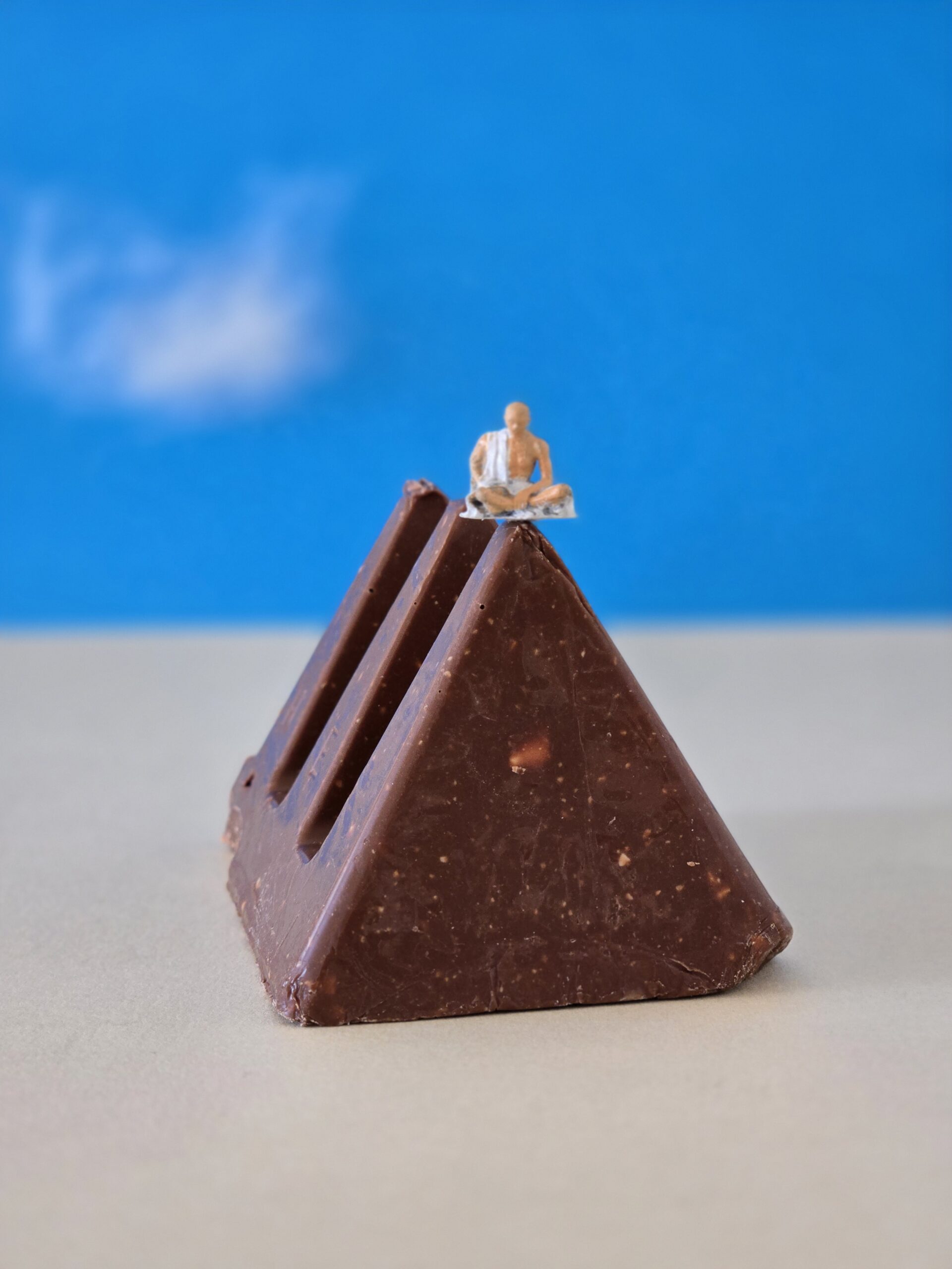 Buddha Sitting on Toblerone Chocolate Mountain